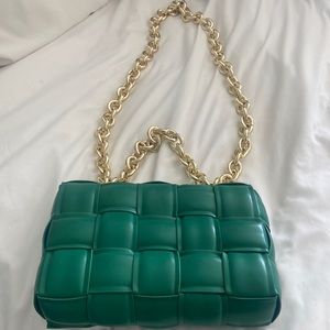 Beautiful Vegan Leather woven handbag .9”w X 7”h. Never used. Cross body .